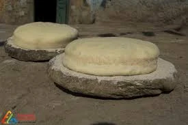image about سر العيش الشمسي في الصعيد:   خبز البركة الذي تخمره أشعة الشمس