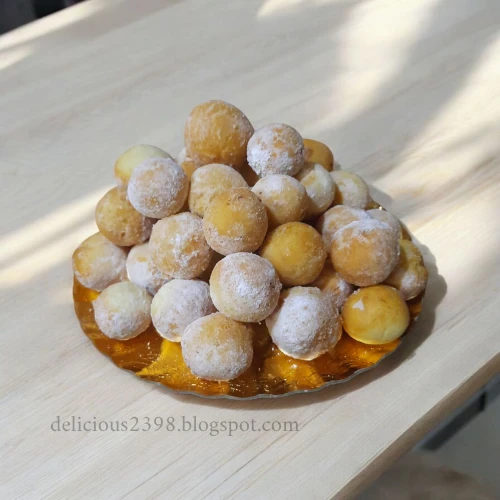 image about طرقة عمل كرات الجبن اللذيذة: حلوى سريعة للضيافة والمناسبات