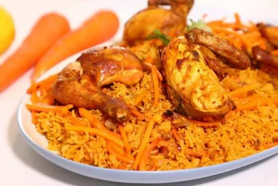 image about 🍚🍗 الأرز البخاري بالدجاج والجزر - وصفة شهية بنكهة شرقية أصيلة