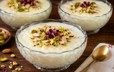 طريقه عمل الرز بلبن بالكريمه والمكسرات 