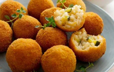 الأرانشيني الإيطالية: كرات الأرز الذهبية بطعم إيطالي أصيل